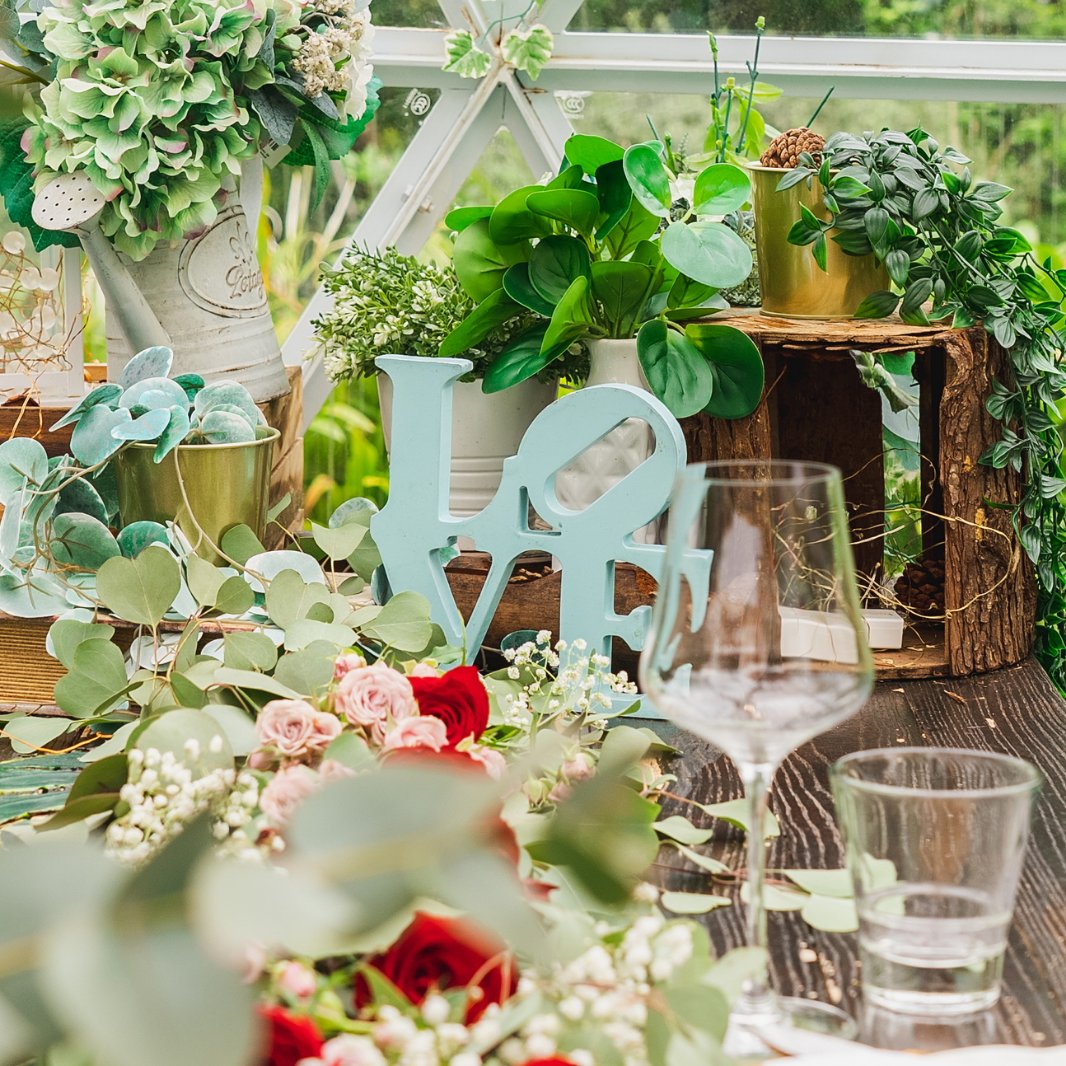 Floral table styling inside a Garden Dome for a celebration at The Summerhouse