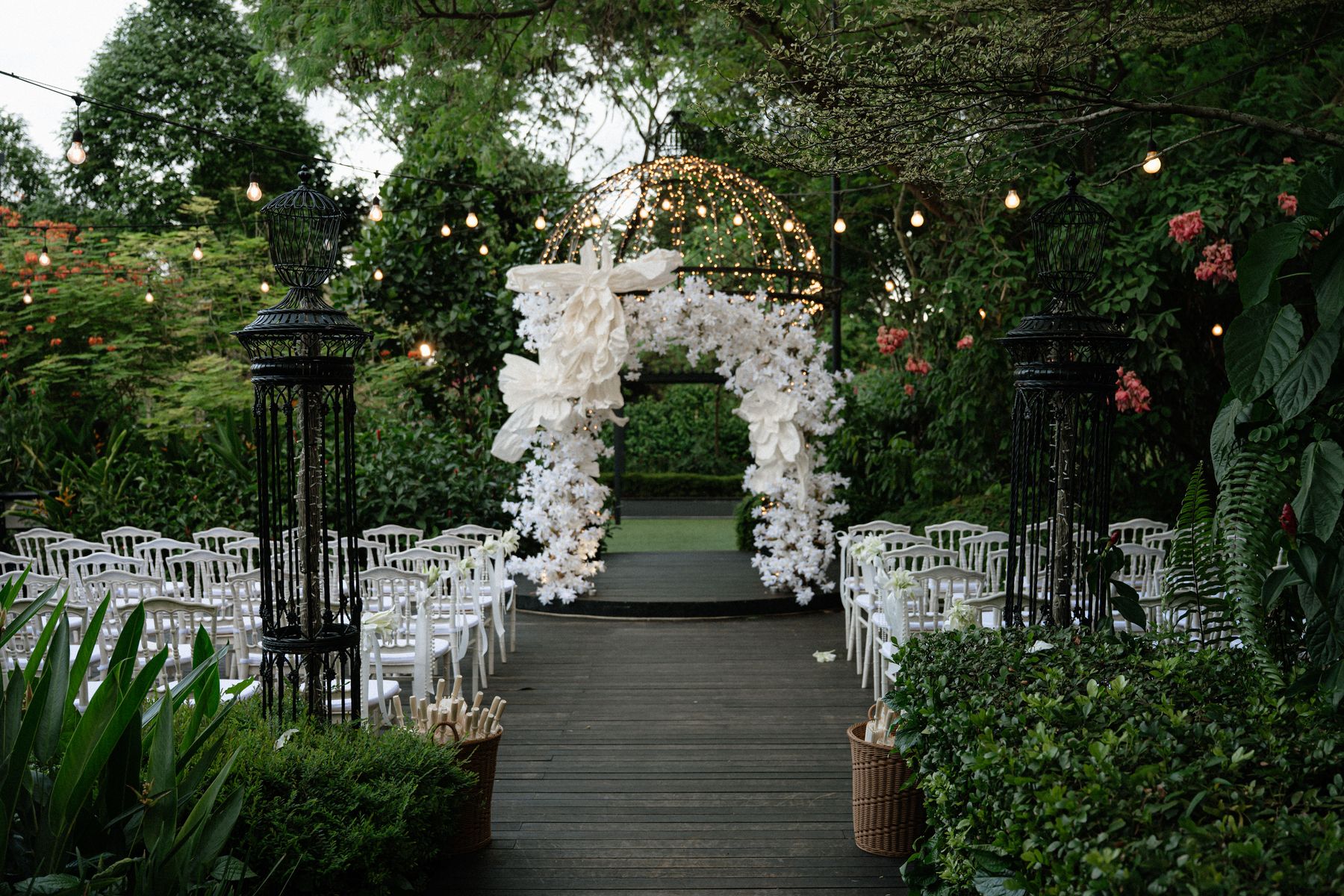 White floral arch at The Gazebo, the outdoor solemnisation venue at The Summerhouse Seletar