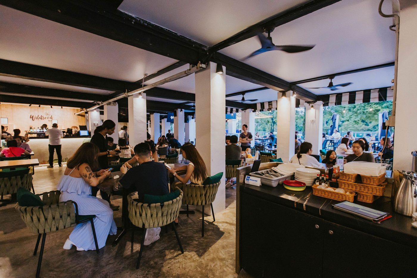Guests seated for an event in the indoor dining hall at The Summerhouse