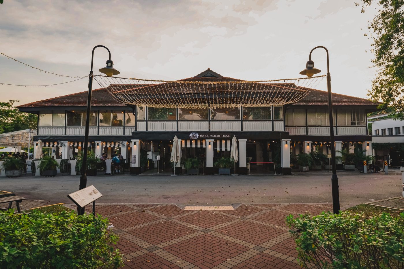 The Summerhouse heritage bungalow with fairy lights at dusk, Seletar Singapore