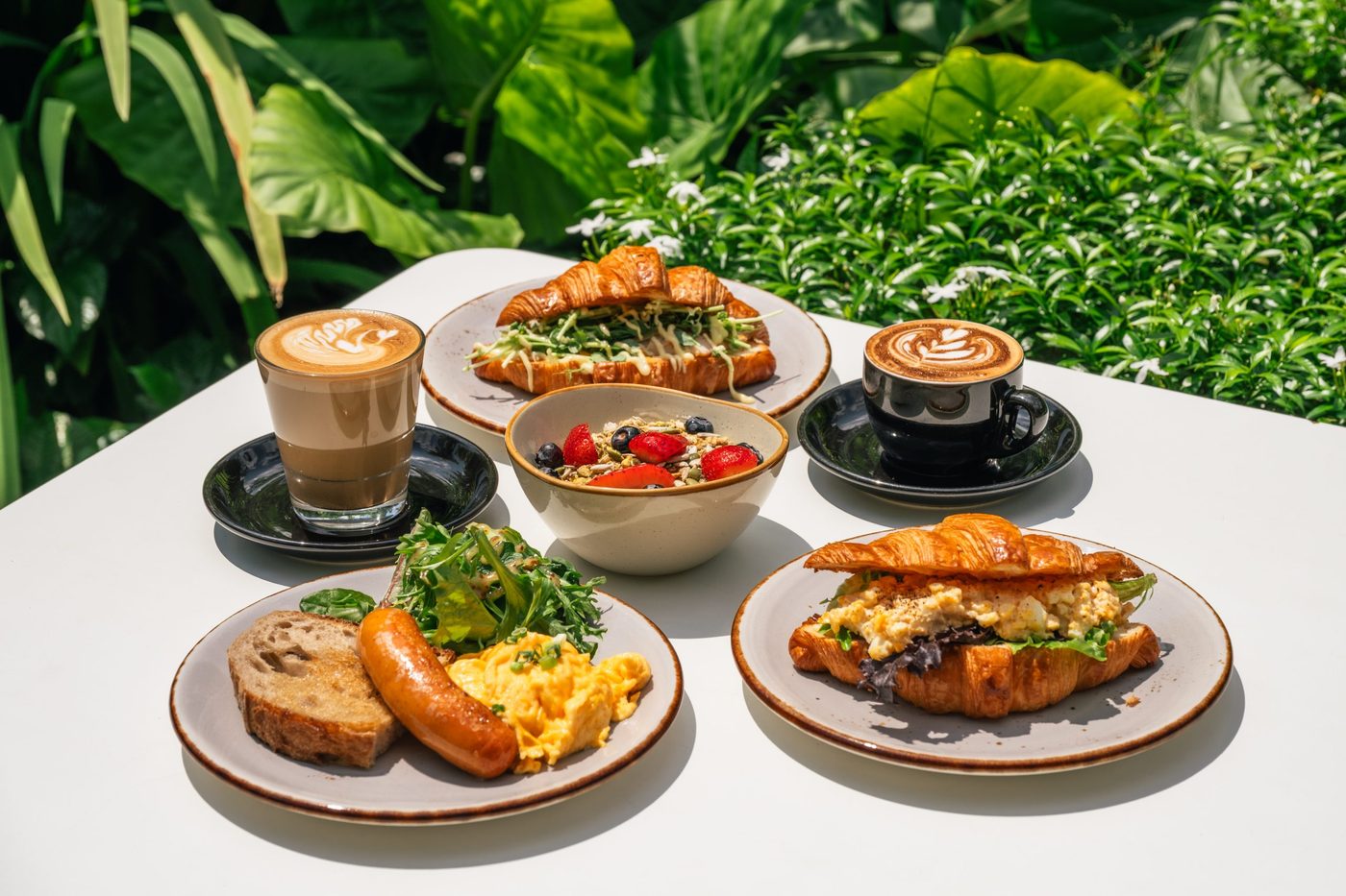 Brunch plates and coffee at Wildseed Cafe, The Summerhouse
